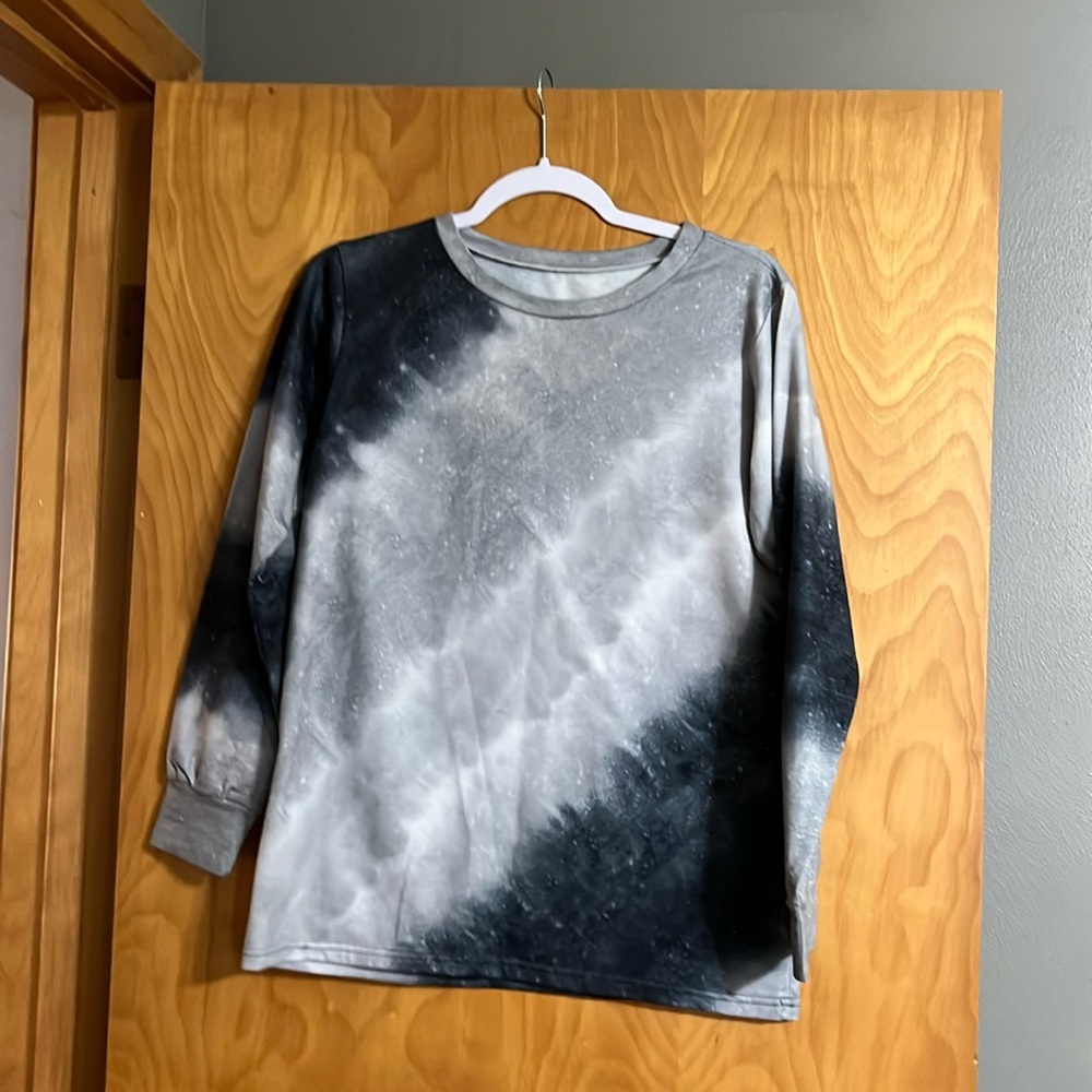 Long Sleeved. Multi colored  Tee size medium hardly wore